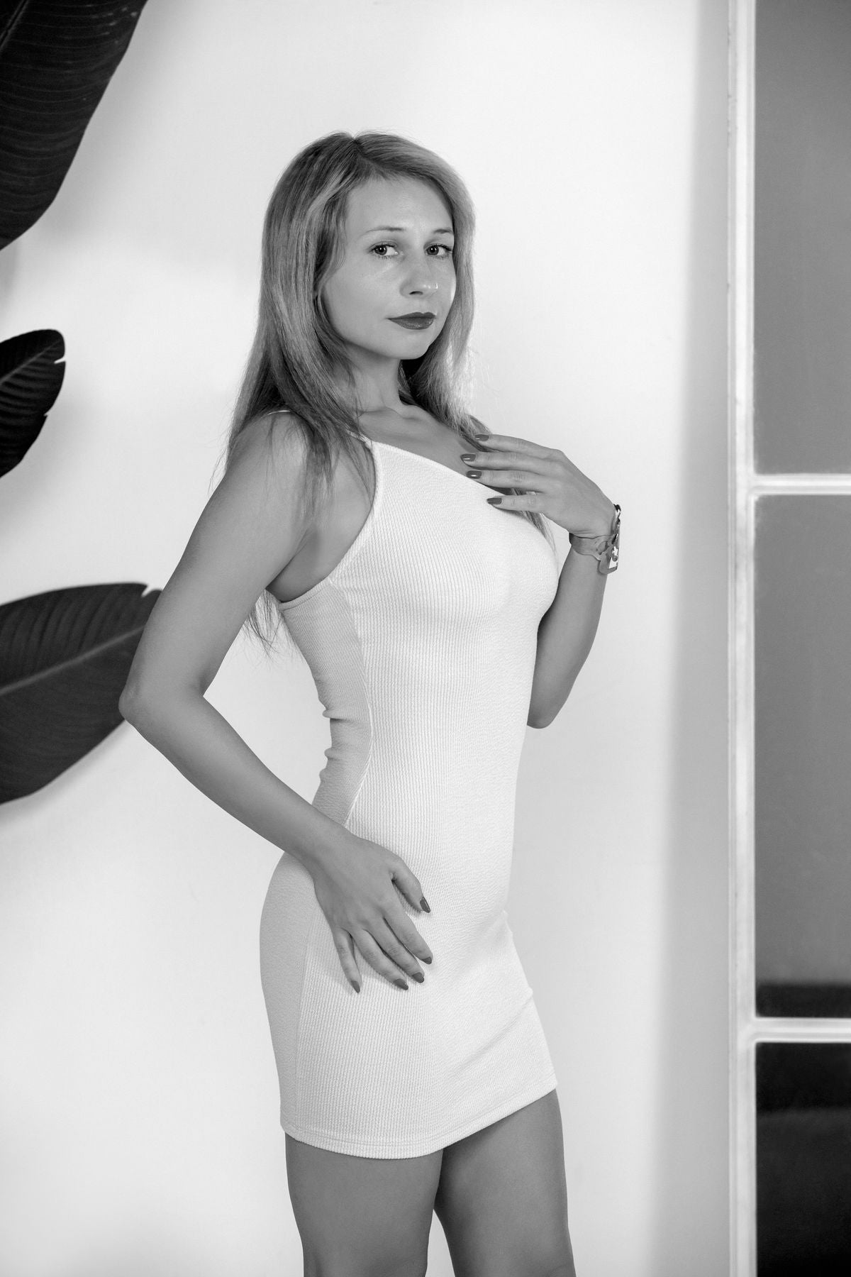 Portrait of a woman in a fitted dress